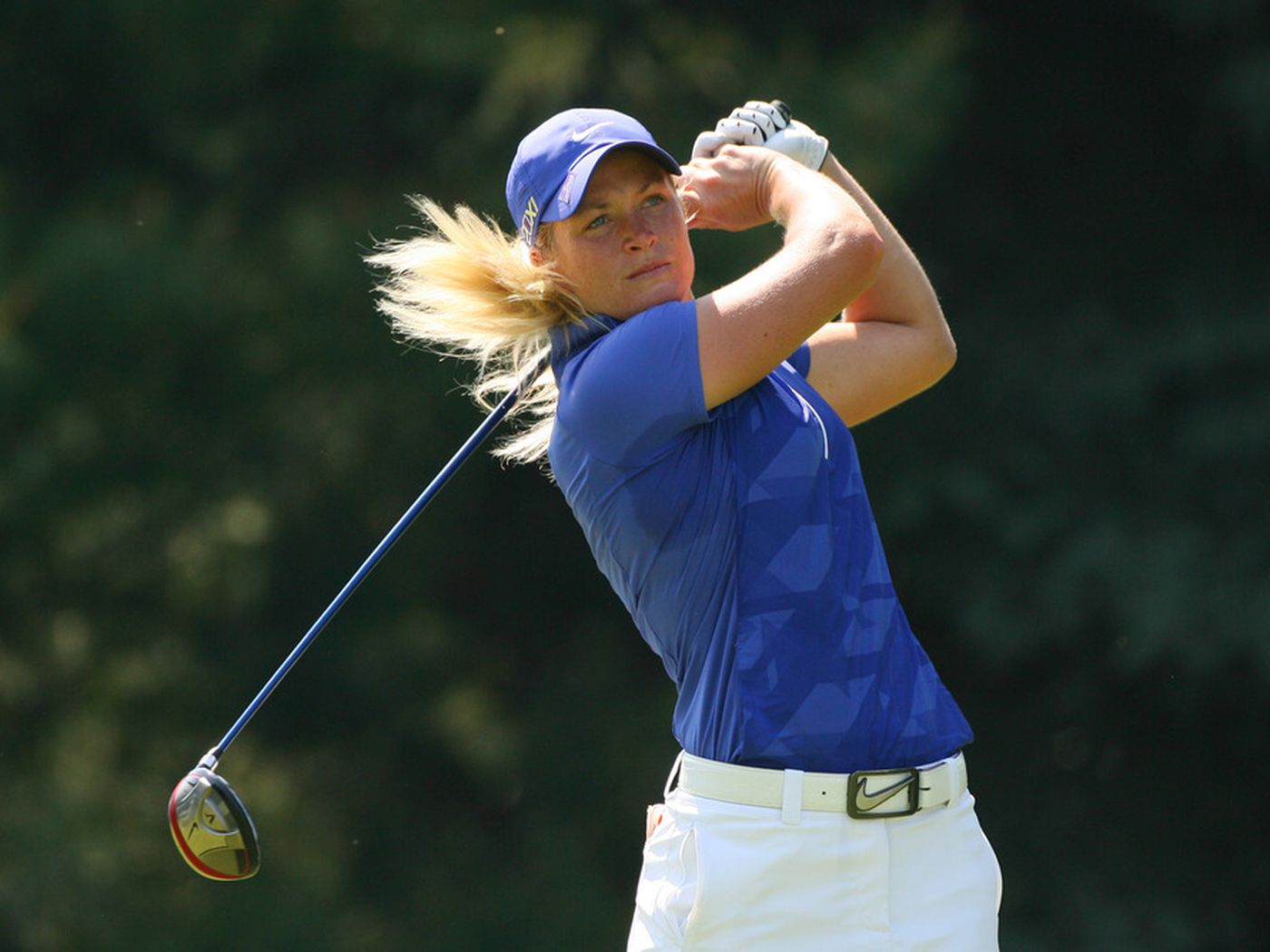 Suzann Pettersen blue polo white pants athletic body